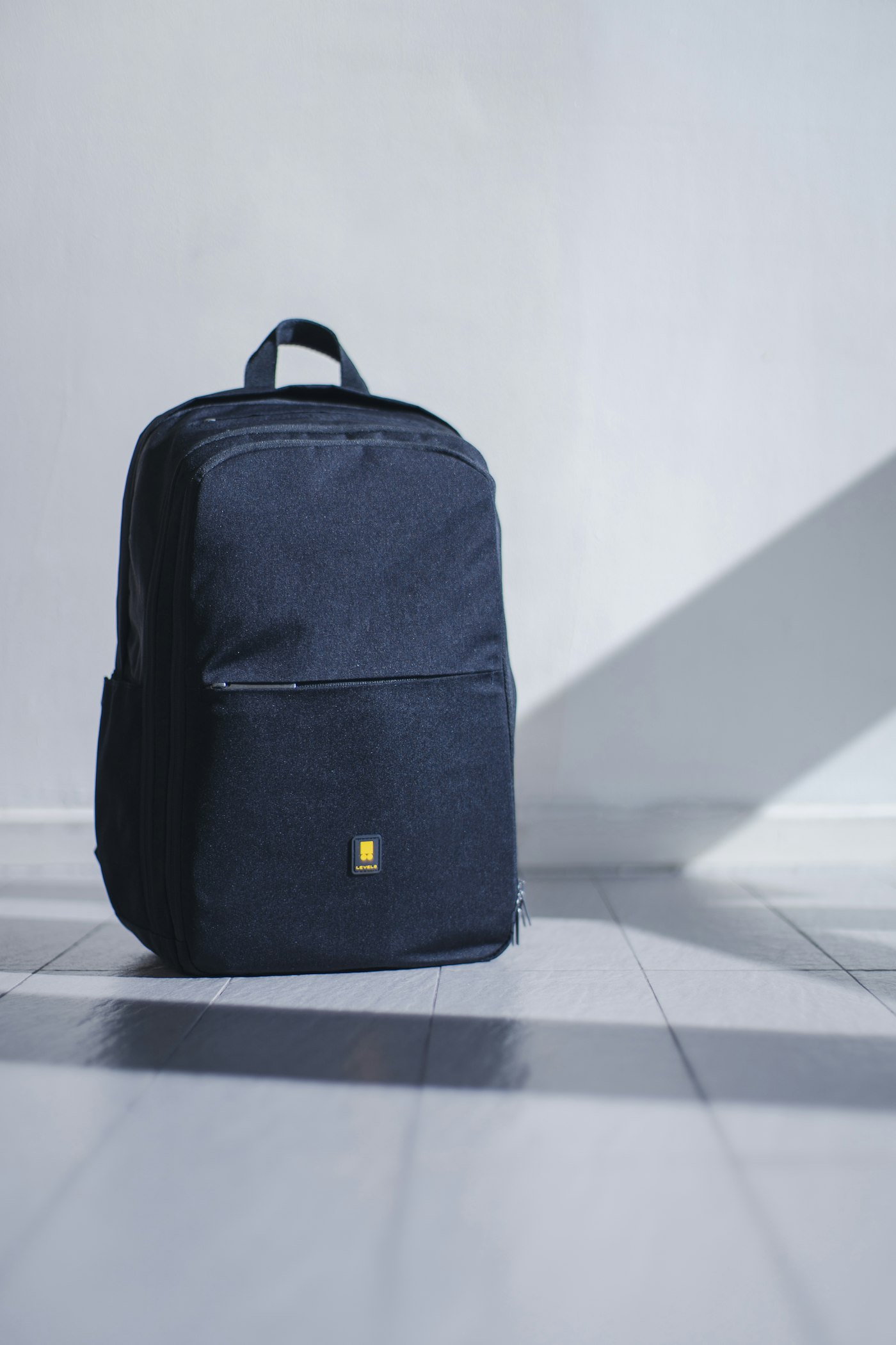 Portable power bank and cables packed in a weekend travel bag