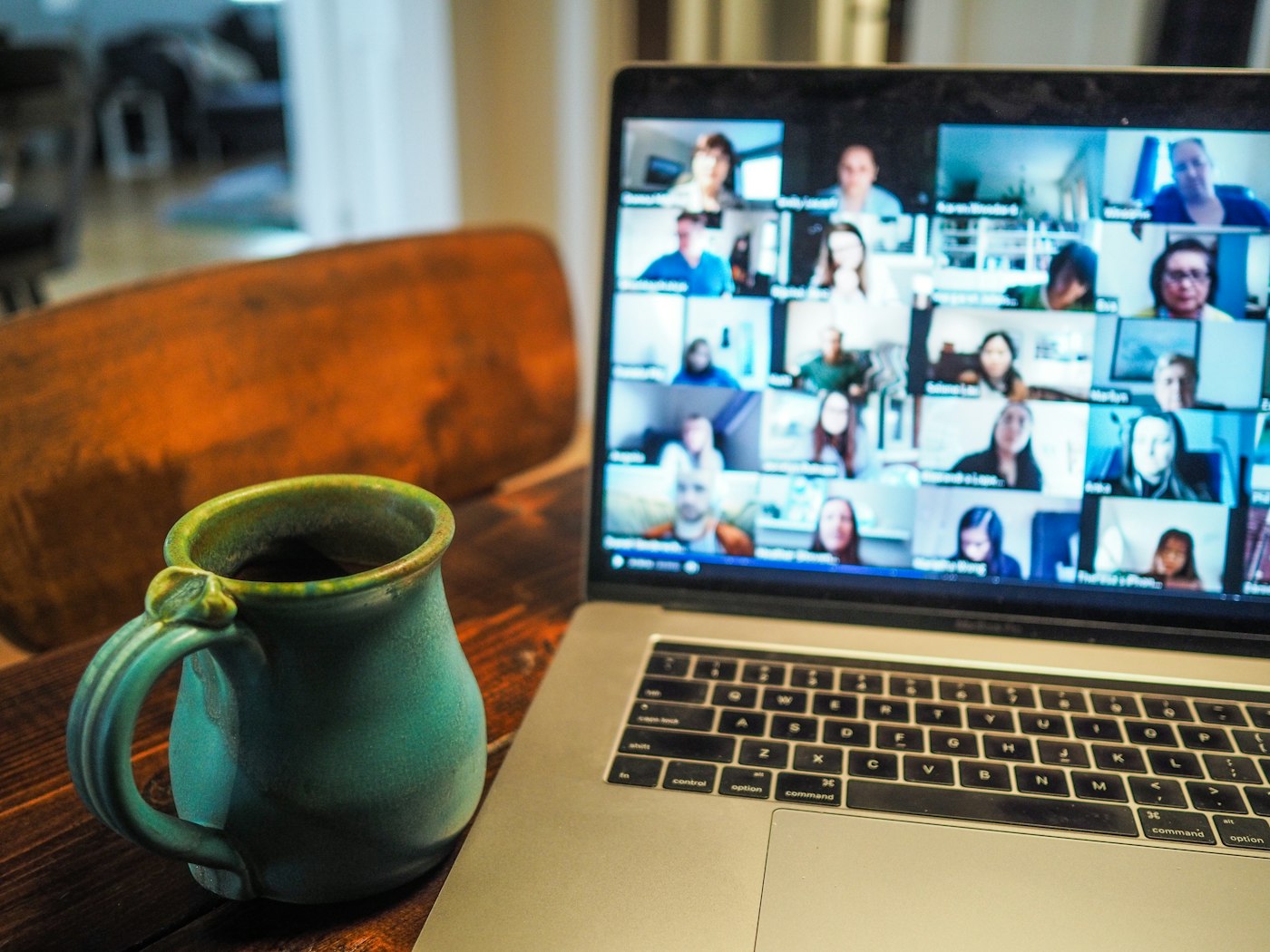 Webcam mounted above a monitor during a video conference